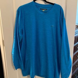 Blue Greg Norman size dry fit long sleeve